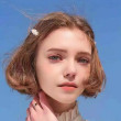 ͷ��